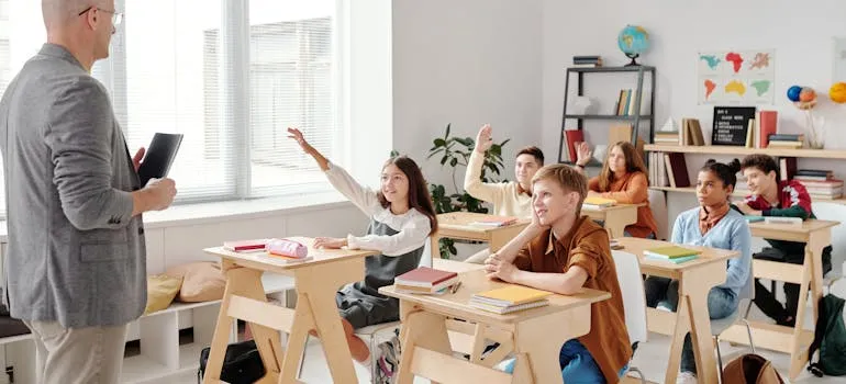 Kids in the classroom talking about raising a family in Maryland vs Delaware