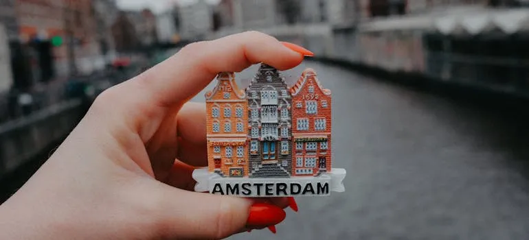 A person holding a magnet