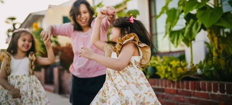 A mother with daughters on the street 