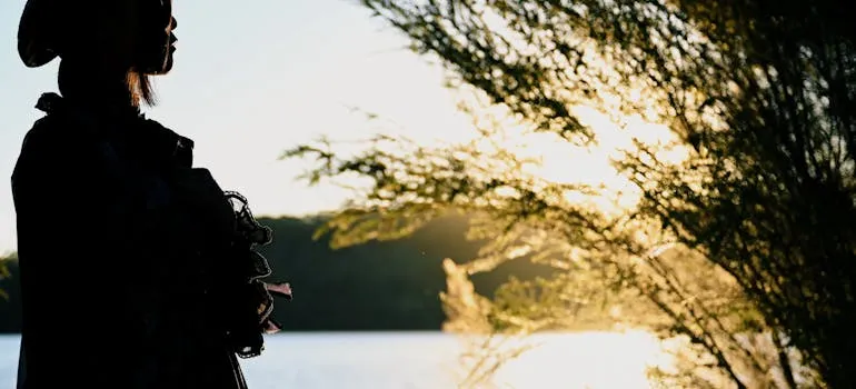 A woman next to the lake