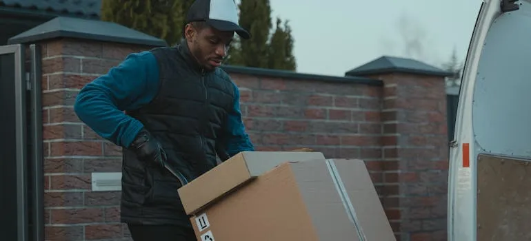 A man with the moving box
