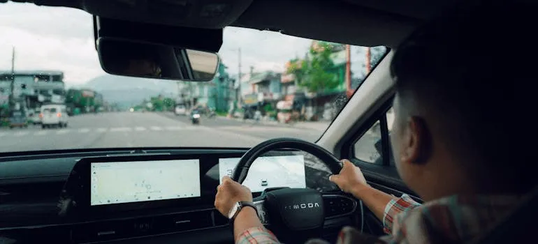A person driving a car