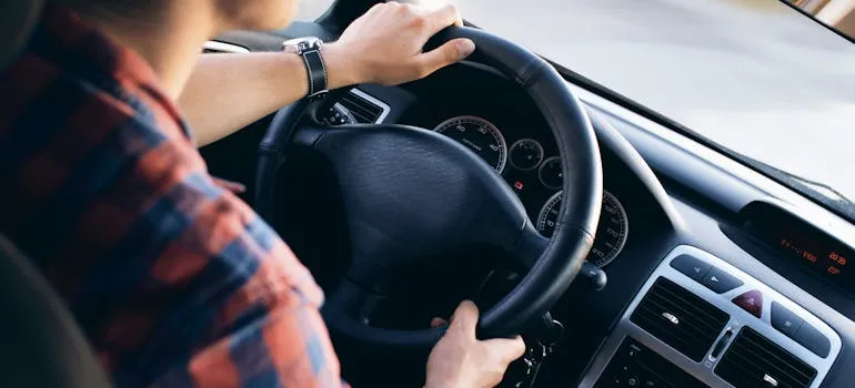 A man driving a car