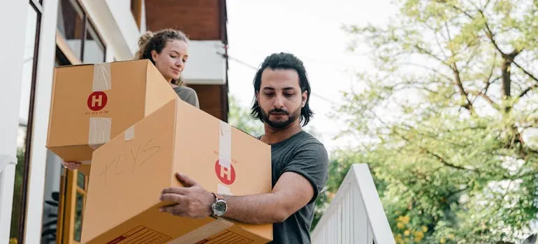 Two people trying to move efficiently in one day
