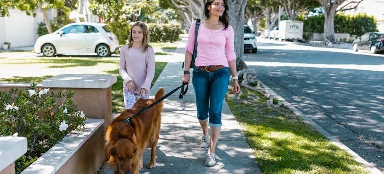 Woman and a daughter on the street
