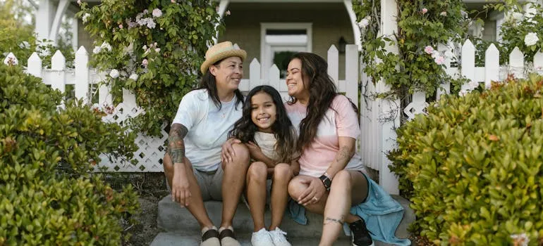 A family in front of the house 