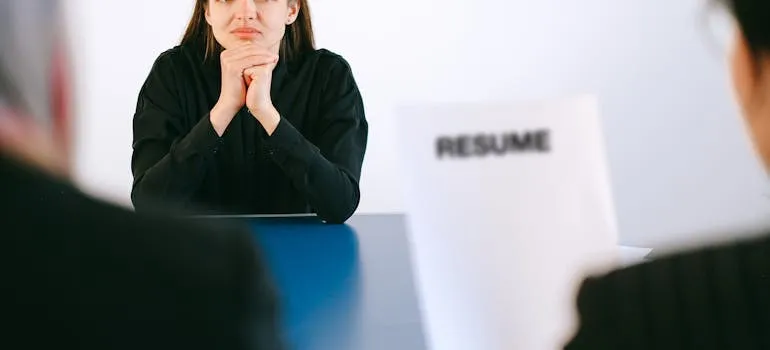A man holding a resume 