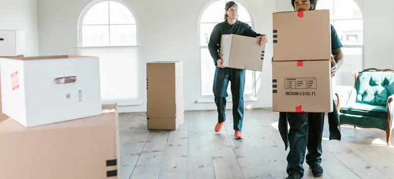 Two movers helping with moving from Maryland to Pennsylvania for retirement