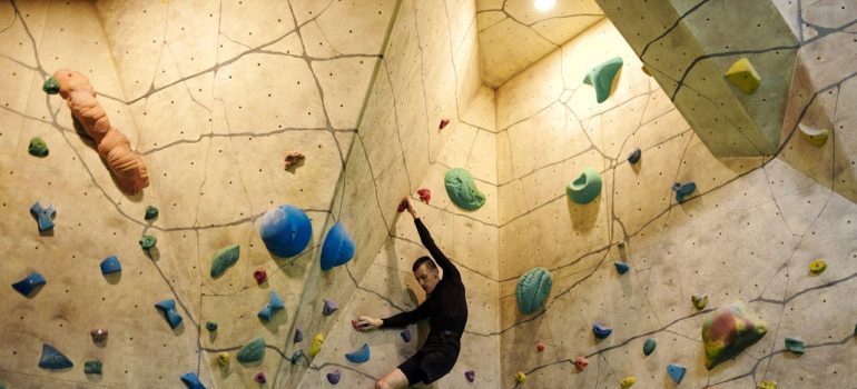 A man doing a rock climbing
