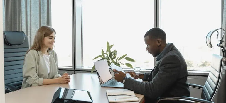 A woman having a job interview in the first 30 days in LA