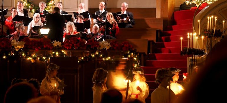 People in the theater celebrating the holidays in Washington