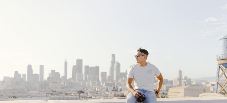 A man in LA thinking about lifestyle changes after relocating from Maryland to California