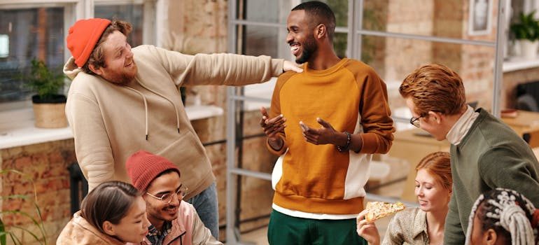 A person talking with friends about how to maintain relationships after relocating far from Rockville