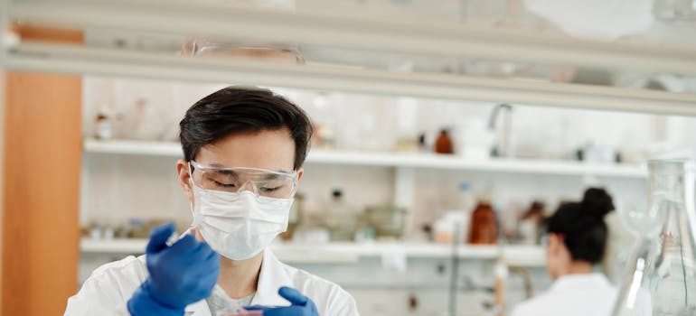 A man in the laboratory in one of the Maryland cities for tech workers moving near innovation hubs