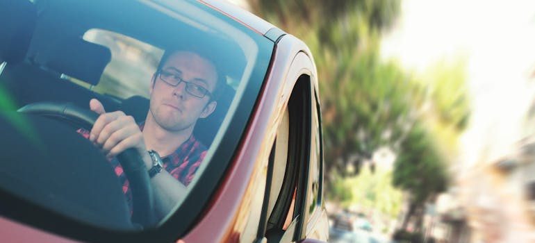 A person driving a car