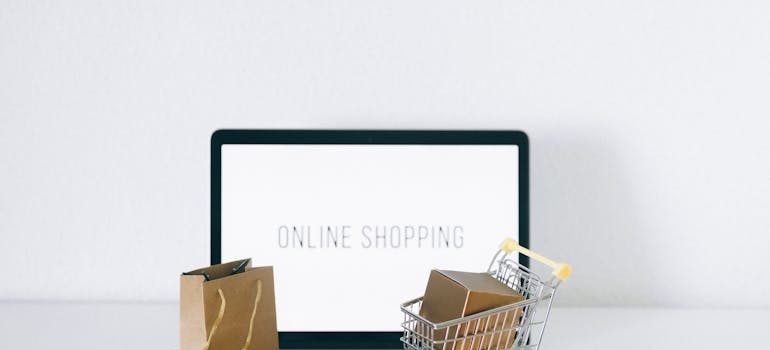Online shopping written on the laptop