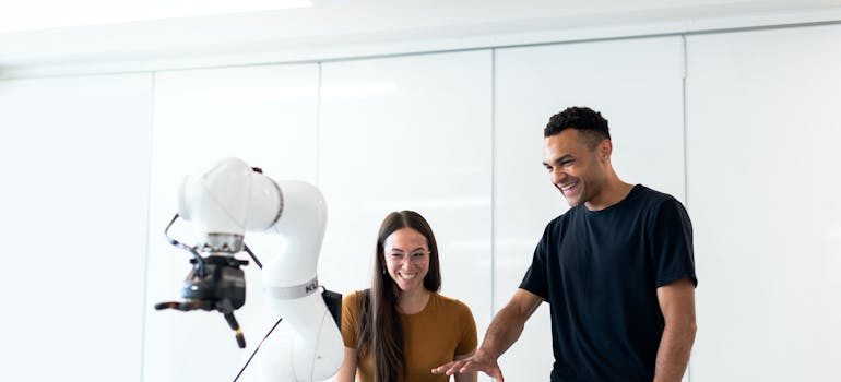 Two people in the office in one if the Maryland cities for tech workers moving near innovation hubs