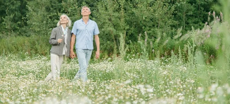 A couple in the park in one of the Delaware towns for retirees moving from Maryland