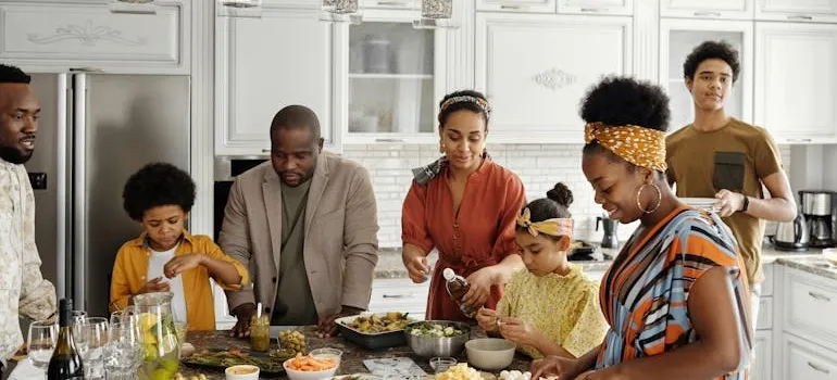 A family in the kitchen in one of the suburbs near Atlanta for families moving from DC