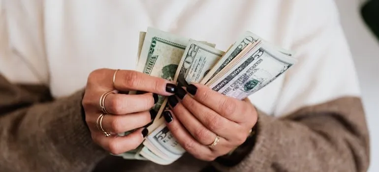 A person counting money 