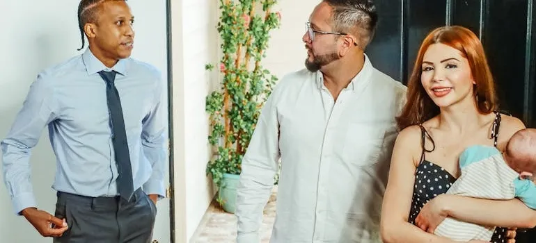 A family with the real estate agent 