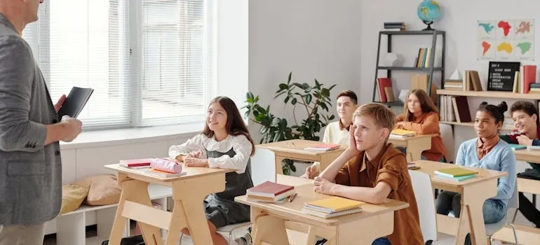 Kids in the classroom learning about Virginia suburbs vs the city