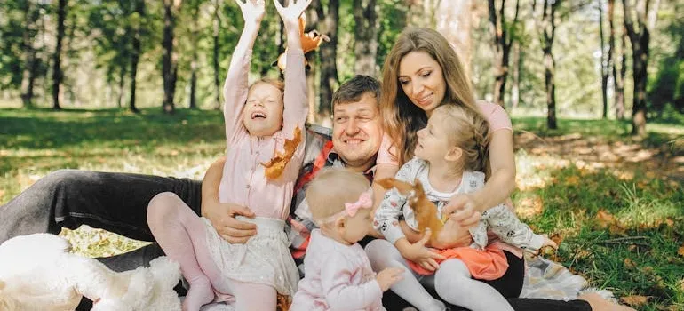 A family in the park in one of the suburbs near Atlanta for families moving from DC