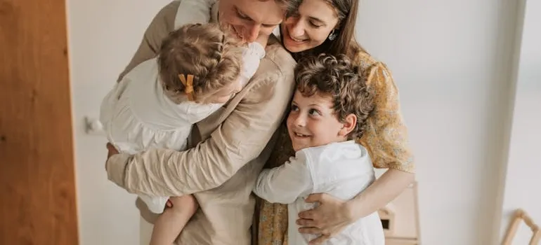 A happy family hugging
