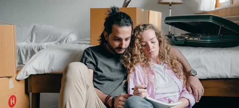 A couple making a plan for moving with kids from Maryland to California