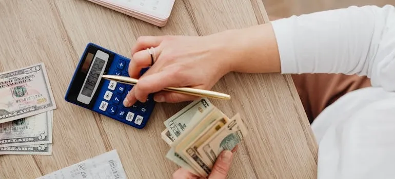 A person using calculator