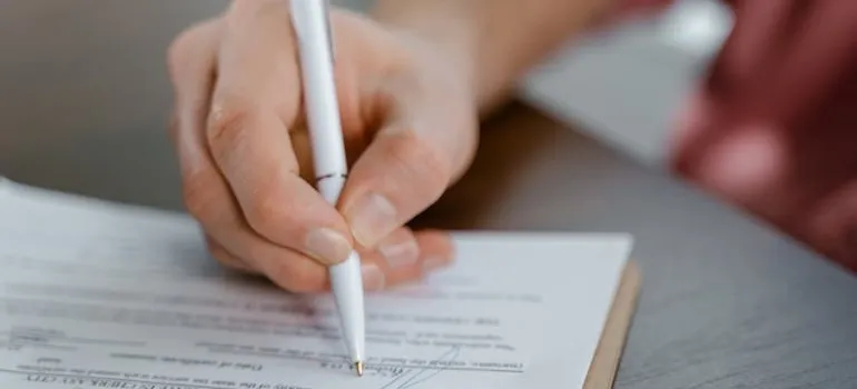 A person signing a contract