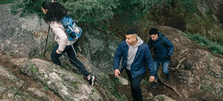 People hiking and talking about outdoor living in Virginia
