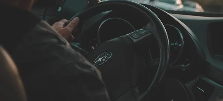 A person driving a car