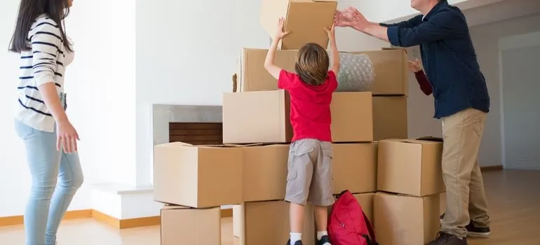 A family packing by following long distance moving tips for families leaving NOVA
