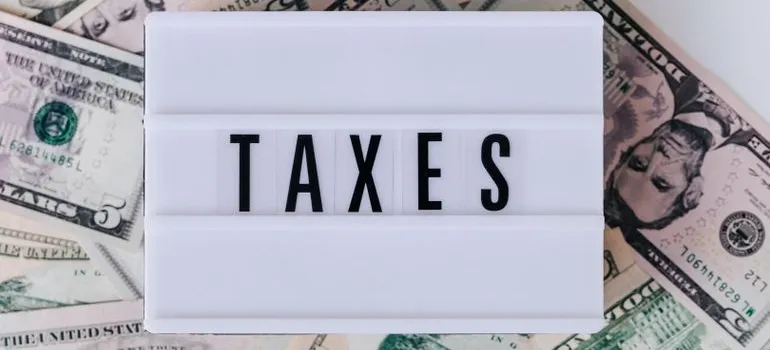 Taxes paper on the dollar bills