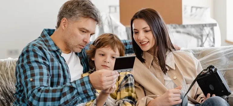 A family looking at the photo