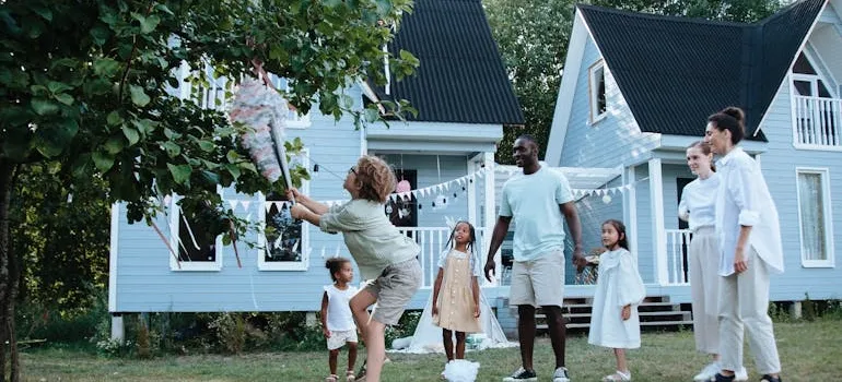 People in front of the house 