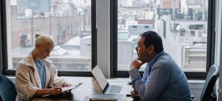 A man and a woman in the office